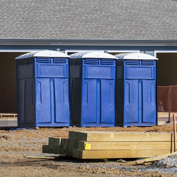 how often are the porta potties cleaned and serviced during a rental period in Roland